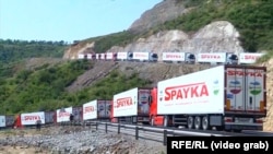 Armenia -- An Armenian convoy of trucks carrying food for Karabakh is stranded near an Azerbaijani checkpoint at the beginning of the Lachin corridor, July 27, 2023.