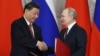 Си Дзинпин и Владимир Путин в Москва