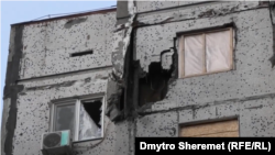 Пошкоджений обстрілом будинок у мікрорайоні Карабел («Острів») у Херсоні, грудень 2022 року