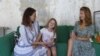 Young Russian woman's IT school for Ukrainians