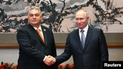 Унгарскиот премиер Виктор Орган и рускиот претседател Владимир Путин на средба во Кина, 17 октомври 2023