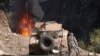 FILE photo of fighting in Waygal district in Afghanistan's Nuristan province.