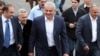 Armenia - Businessman Samvel Karapetian (center) arrives for the consecration of a new church in Abovian, May 14, 2013.