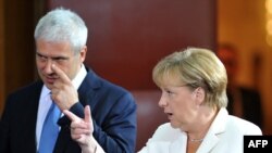 Президент Сербії Борис Тадич та канцлер Німеччини Анґела Меркель