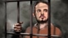 Илустрација - Новинарот на Радио Слободна Европа, Фарид Мехрализада во азербејџански затвор