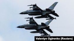 Истребители F-16 во время празднования Дня Воздушных сил Украины. Киевская область, 4 августа 2024 года
