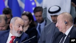 Ерменскиот премиер Никол Пашинијан (лево) и азербејџанскиот претседател Илхам Алиев (фотоархива).