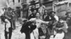 file -- Picture dated 28 February 1947 shows the scene after a terror attack in Ben Yehuda Street in Jerusalem. On November 29, 1947, the United Nations' General Assembly voted resolution 181 on the partition of Palestine in two states, one Jewish and one