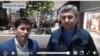 Sharofiddin Gadoev (left) with Muhiddin Kabiri, the exiled leader of the banned Islamic Party of Tajikistan, in a video purportedly shot at Frankfurt Airport on March 2.