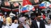 West Steps Up Pressure On Russia Over Syria, Assad Allies Threaten To Respond To 'Aggression'