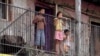 Slovakia - Romany kids in the Angi Mlyn neighborhood in Michalovce, eastern Slovakia. Roma gypsies children screen grab