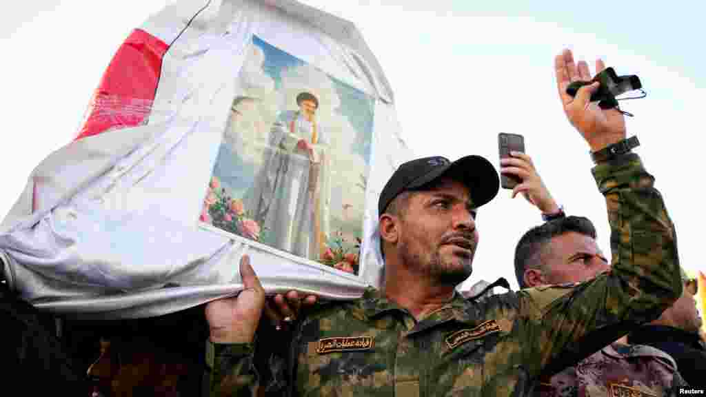 Az iraki Bászrában is tartottak szimbolikus temetést a Hezbollah-vezérnek. A támadásban három lakóház teljesen megsemmisült, további kettő pedig megrongálódott. Az első helyszíni becslések szerint háromszáz ember halt meg